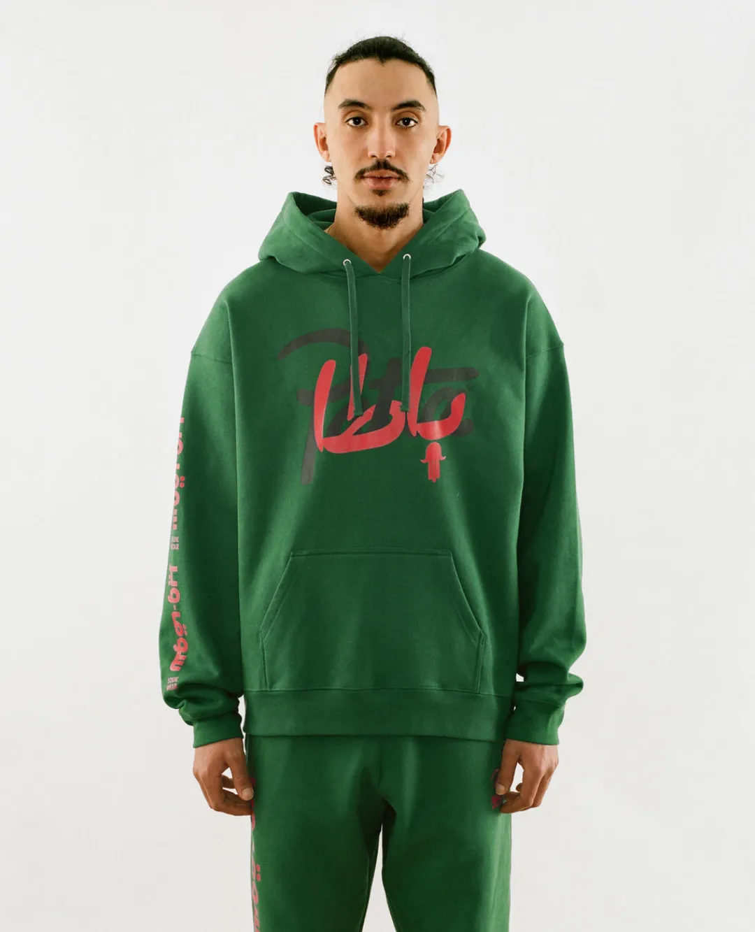 * Patta X Andy Wahloo (Hassan Hajjaj) Script Logo Boxy Hooded Sweater (E